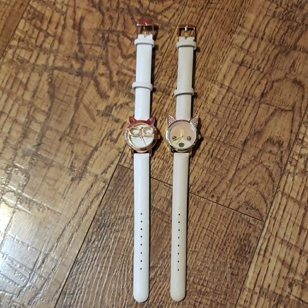 Brand new watches. One is a cat, dog. Super cute.